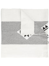 Estrella Shawl with geometric patterns in black and white