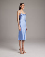 Bias cut Midi Slip Dress in blue, elegantly drapes on the body