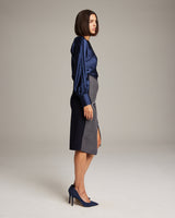 Model wearing Arrow Wrap Pencil Skirt in Navy/Opal, side view