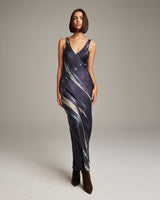 Model wearing a Midnight Double V Tie Dye Dress, showcasing its elegant design and fit.
