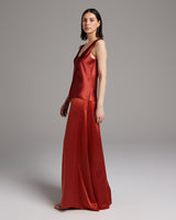 Model wearing a Silk Raw Edge Tank in aubergine with matching palazzo pants