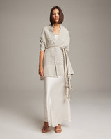 Model wearing a hand-braided Rope Belt Wool over a white dress