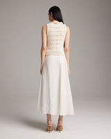 Model wearing a Longer Flammé Knit Crop Top, back view