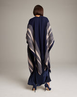 Back view of a navy and beige striped Zig Zag Duster worn over a dress