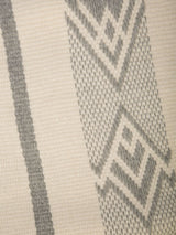 Close-up of Wide Diagonal Alpaca Blanket showing intricate pattern in grey and cream