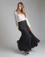 Model wearing a Georgette Long Double Layer Skirt, flowing fabric, black color
