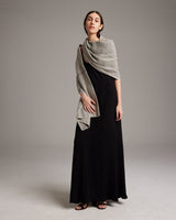 Model wearing Lineas Shawl in Baby Alpaca, showcasing its design and texture