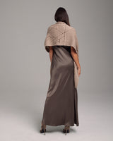 Model wearing Raiz Shawl in Baby Alpaca, showcasing its design and texture.