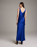 Back view of a blue Double V Slip Dress in sandwashed silk