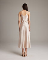 Back view of VOZ V-Neck Slip Dress in peach color
