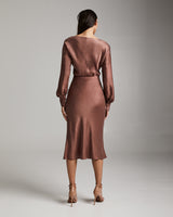 Model wearing a Bias Midi Skirt in Cupro Rayon, back view