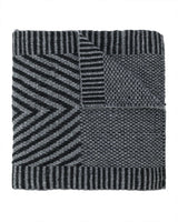 Hand-loomed Chevron scarf in grey tones, featuring graphic patterns