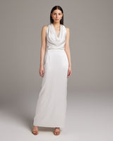 Model wearing a bridal convertible halter dress in ivory, showcasing its elegant design.