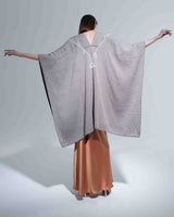 Model wearing a Copihue Duster in Pima Cotton, showcasing the back view.