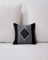 Diamante Square Pillow with diamond pattern and text design in black and gray