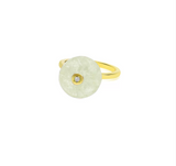 14k yellow gold ring featuring a round quartz stone with a diamond center