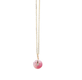 Millapani Cuarzo Necklace featuring a round rose quartz pendant with a diamond bezel