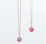 Millapani Cuarzo Necklace featuring rose quartz and diamond bezel
