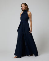 Model wearing a navy Matte Chiffon Palazzo Jumpsuit with a belt