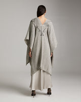 Back view of a model wearing a grey Copihue Duster in Baby Alpaca