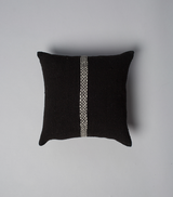 Black square pillow with white stripe in the center