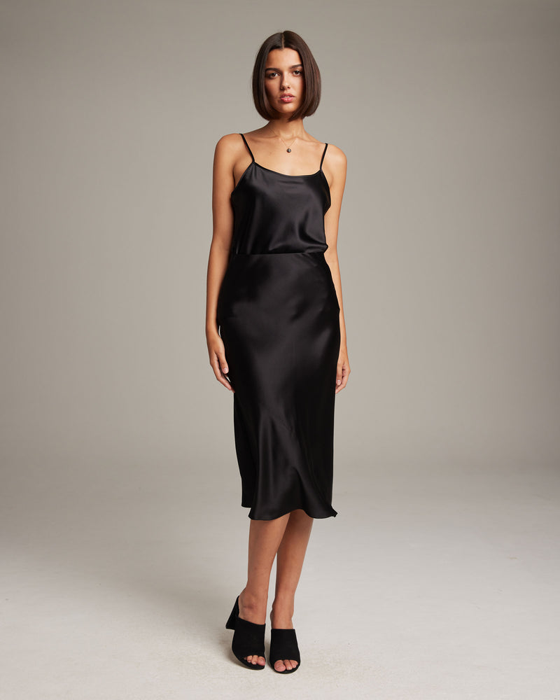Silk midi skirt in black - The Sei